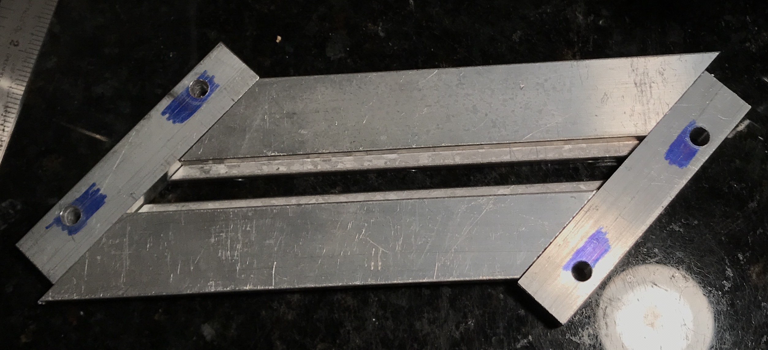 All six parts of the sliding clamp jig